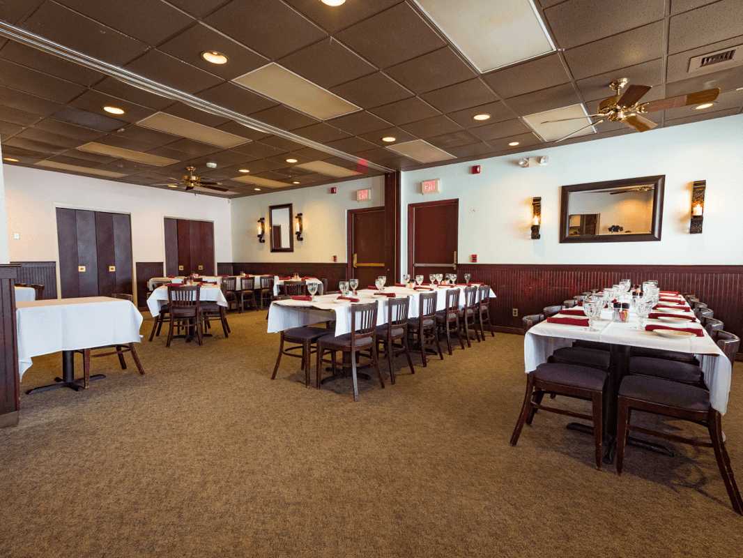 Banquet room with nicely laid out tables