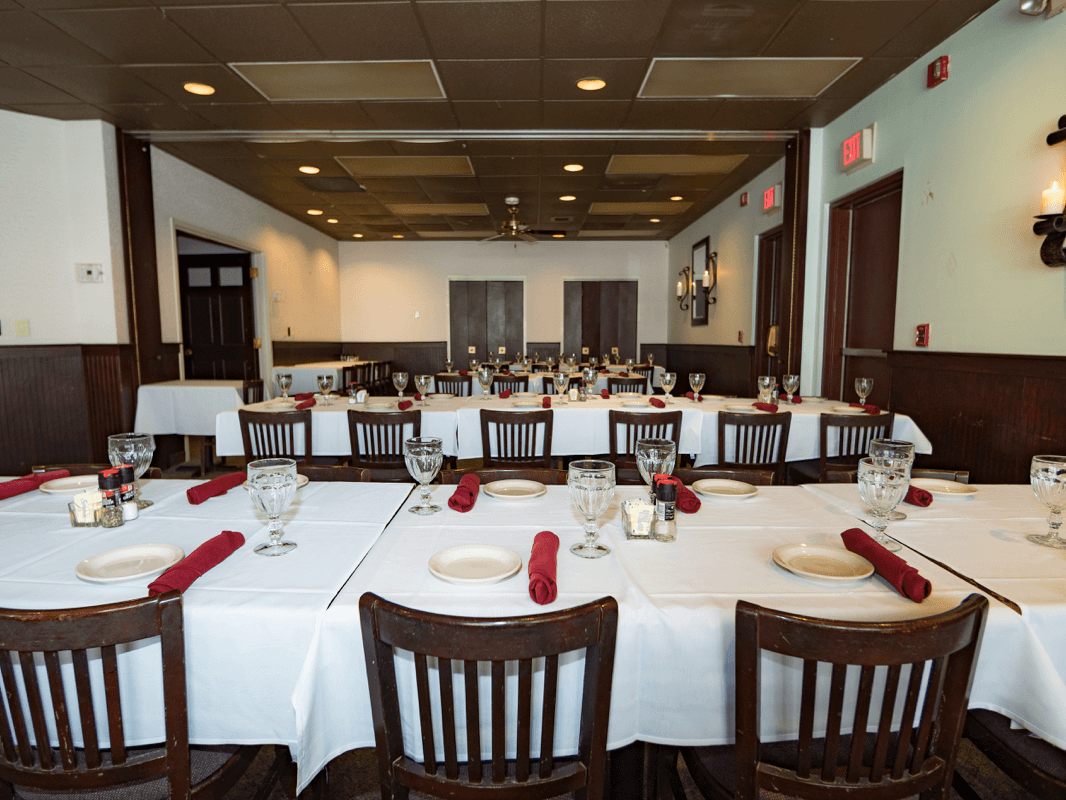 Banquet room with nicely laid out tables